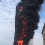 China: Massive fire outbreaks at Chinese Skyscraper blazing hundreds alive (videos)