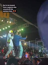 Singer Bella Shmurda's fans shoved him off the stage during show [Video]