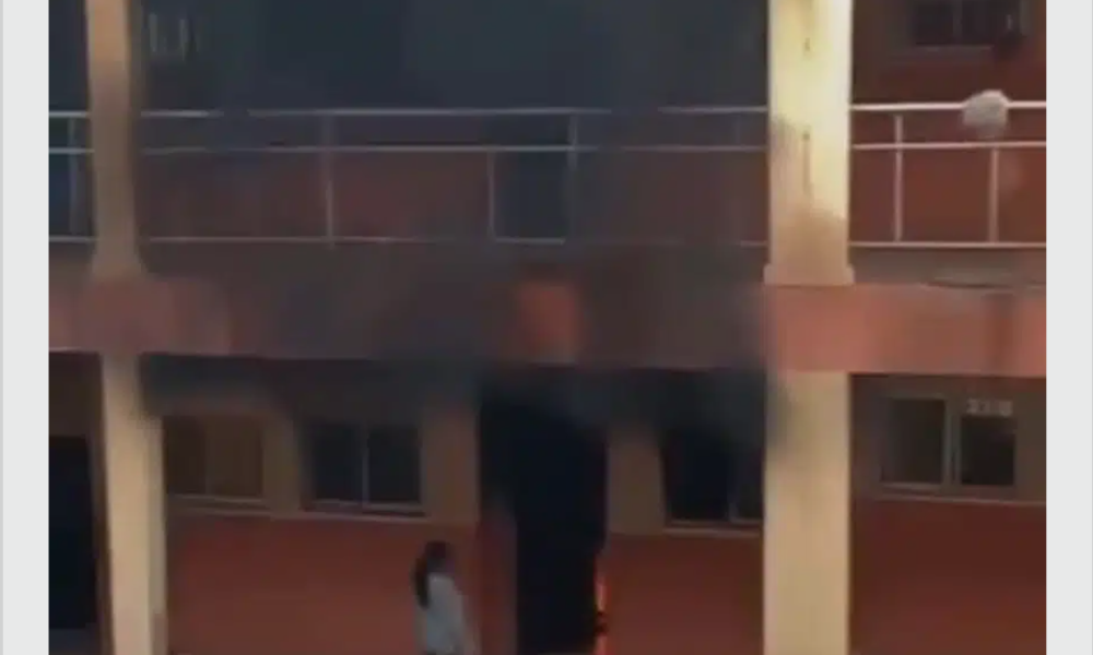 UniAbuja student wielding knife sets hostel on fire (Video)
