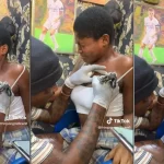“U haven’t seen anything yet” -  Netizens react as a video of a lady screaming in pain while getting a tattoo on her chest surfaces online